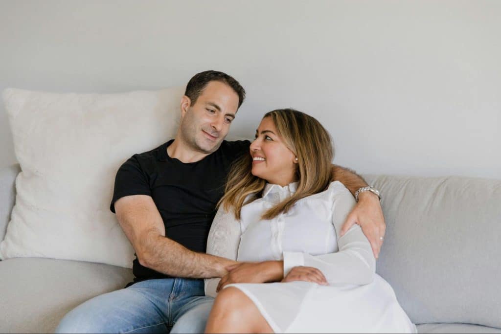 A man assuring a woman