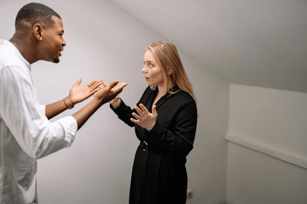 A man and woman arguing