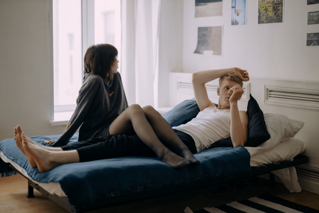 A Couple Resting in Bed