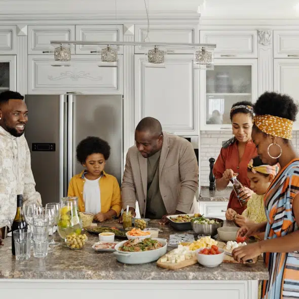 Family preparing foods in the kitchen