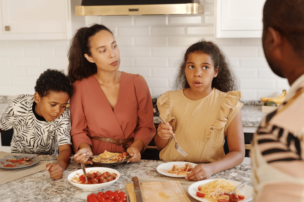 Family eating breakfast in a kitchen