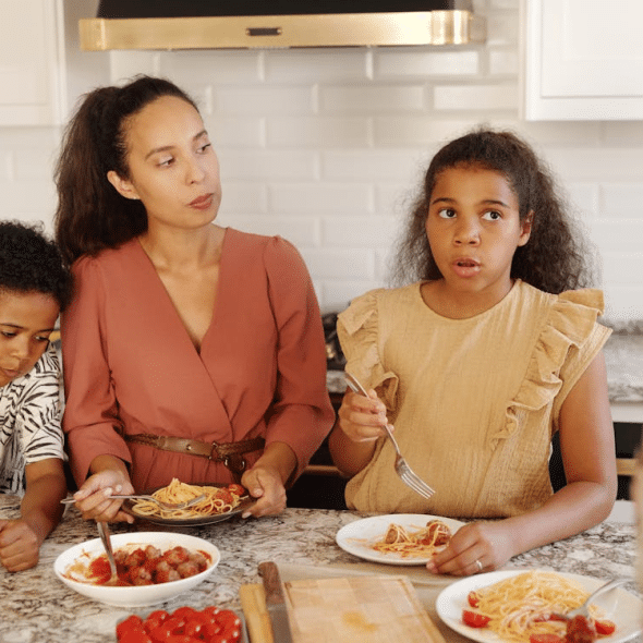 Family eating breakfast in a kitchen