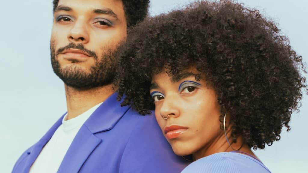 A man and woman posing for a picture.