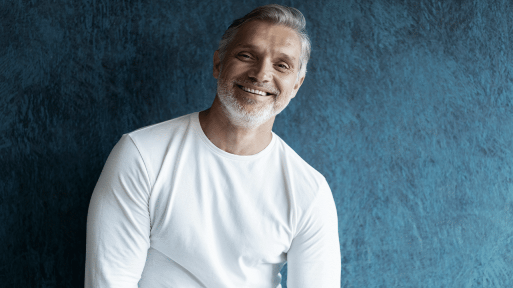 A handsome mature man smiling