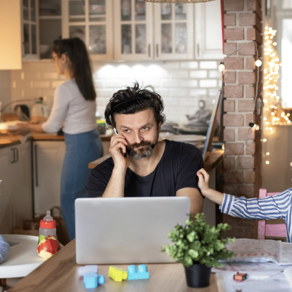 A dad busy at home
