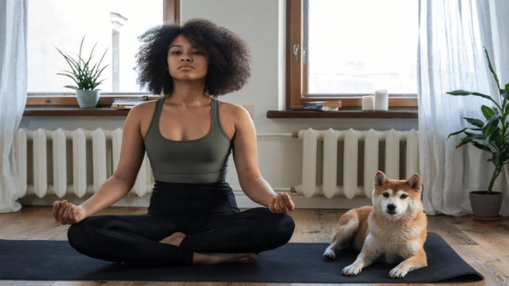 A woman doing yoga at home