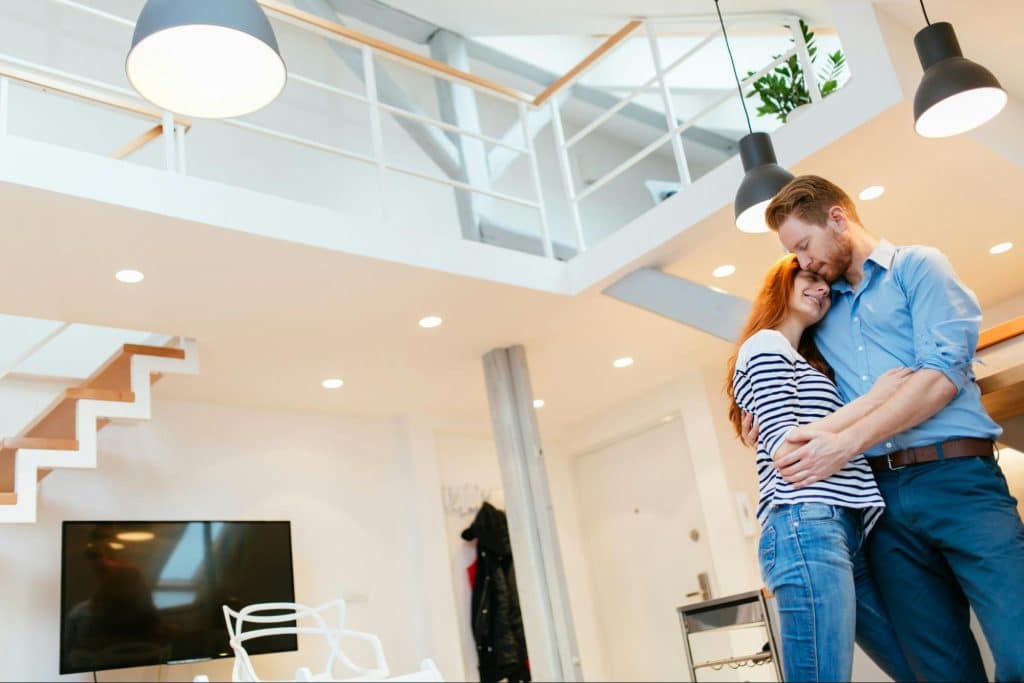 A man and woman hugging
