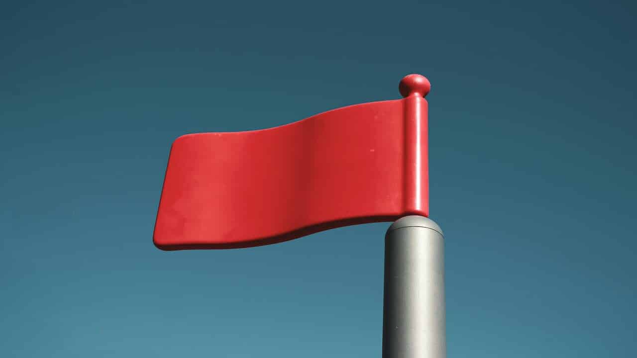 A graphic of a red flag