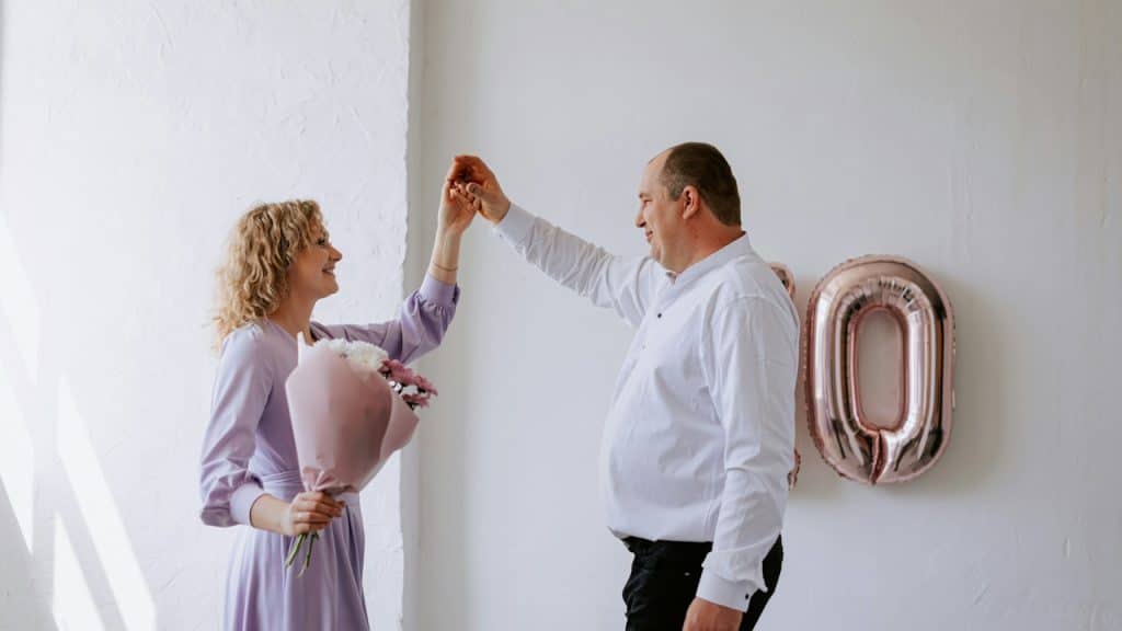 A man and a woman dancing on their wedding anniversary.