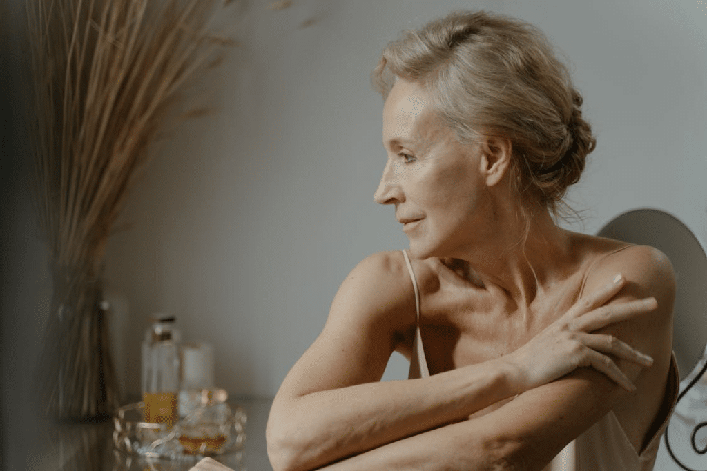 Elderly Woman in a Nightgown
