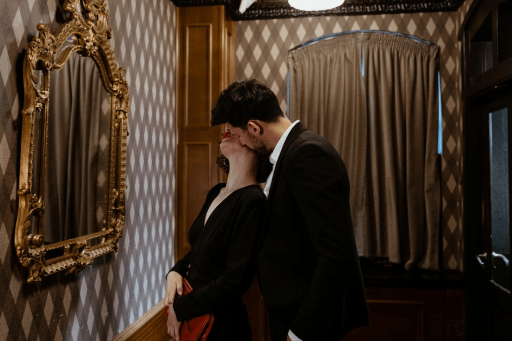 A man kissing a woman