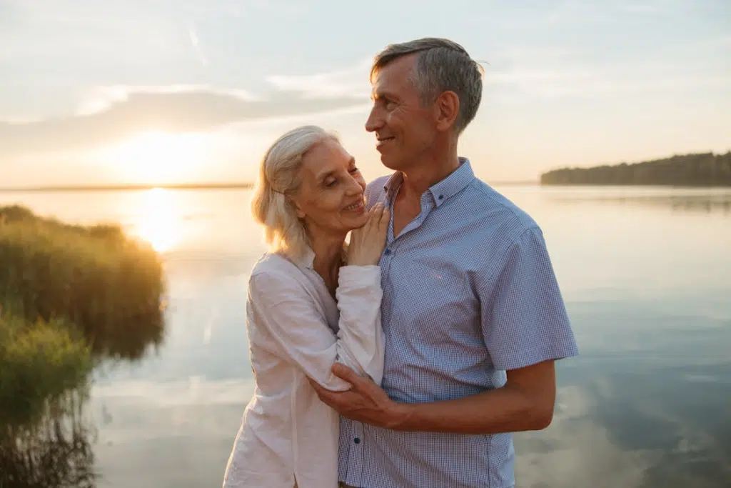 A sweet couple near the water
