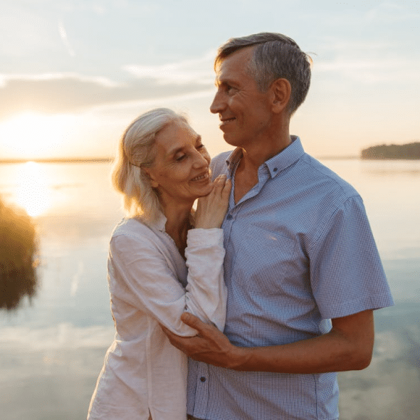 A sweet couple near the water