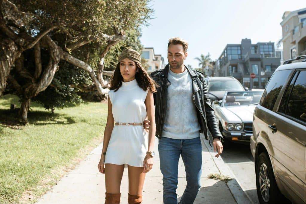 A man following a woman