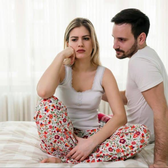 A man looking at the woman