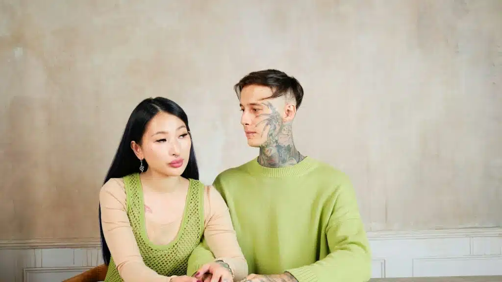 A man and a woman sitting at a table.