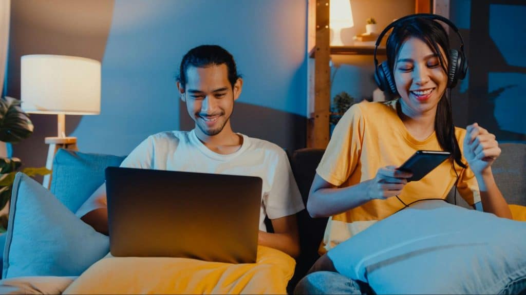 A man and woman at the couch