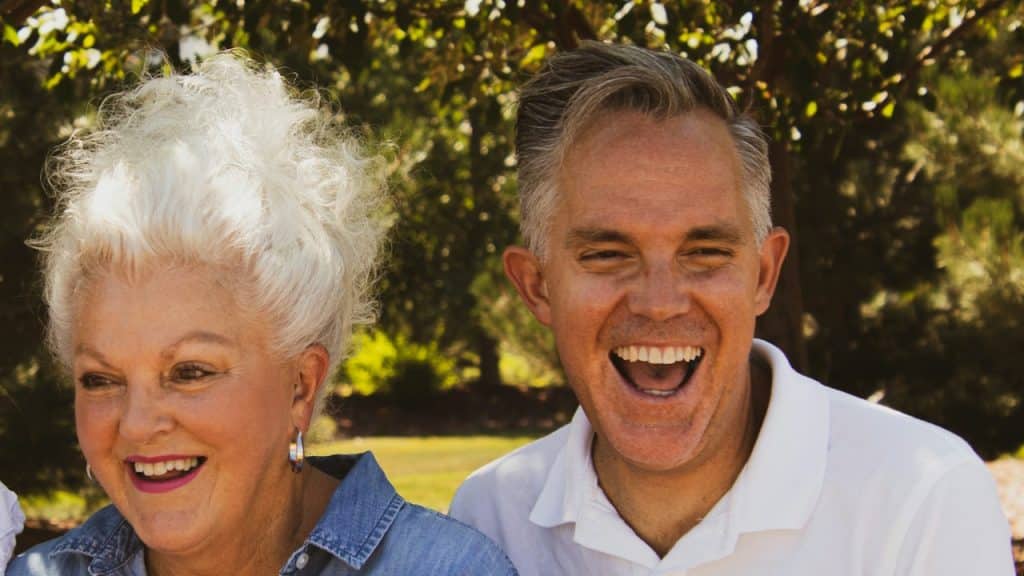 A couple laughing together.