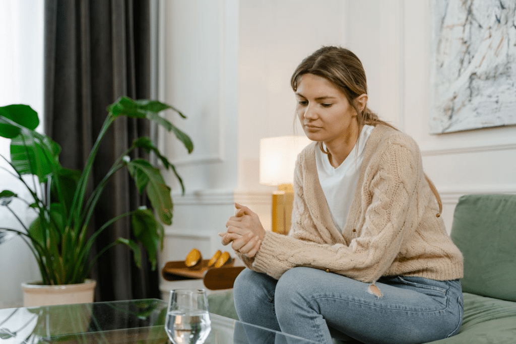 Woman sitting on couch in a therapy session