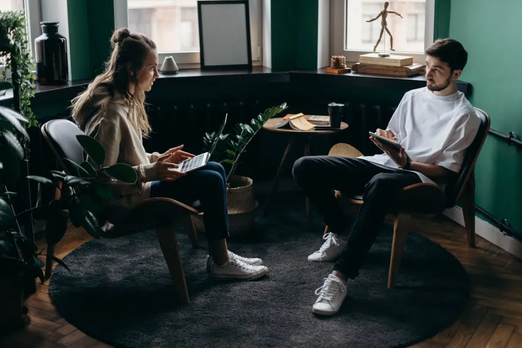 A man and a woman talking to each other