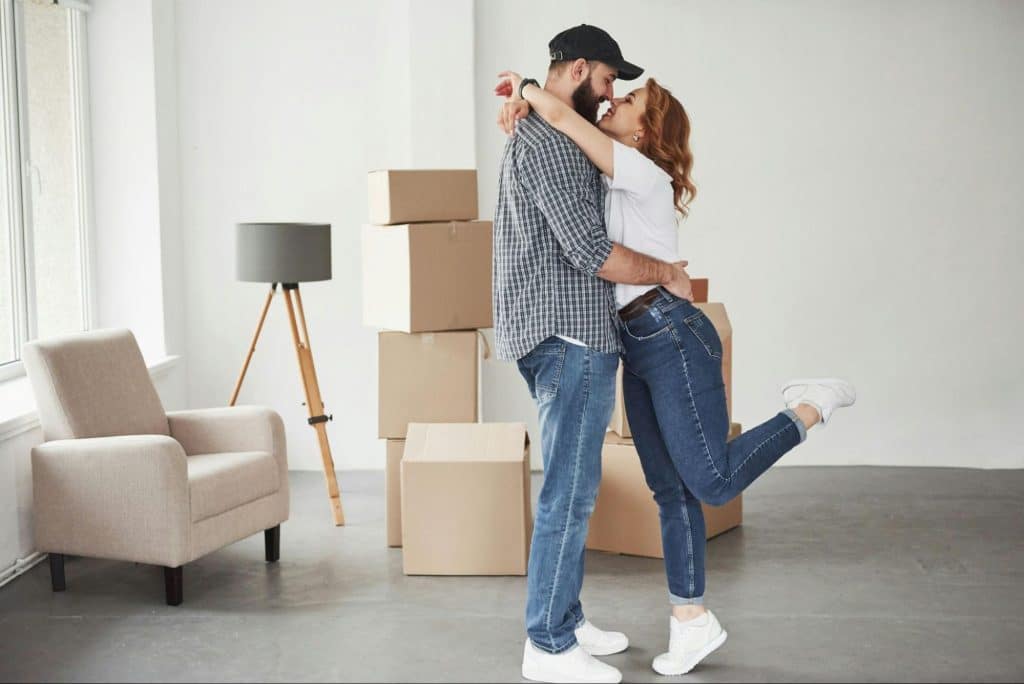 A man and woman at the apartment
