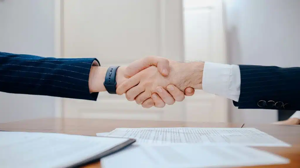 Two businessmen shaking hands