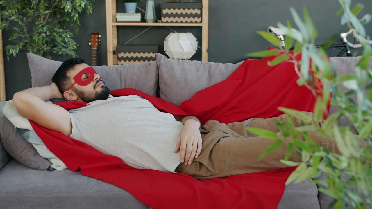 A man sleeping on the couch