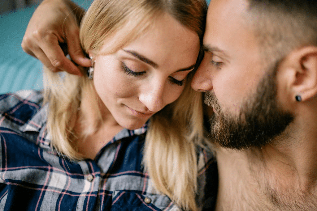 Close-up of a Couple Sitting Head to Head