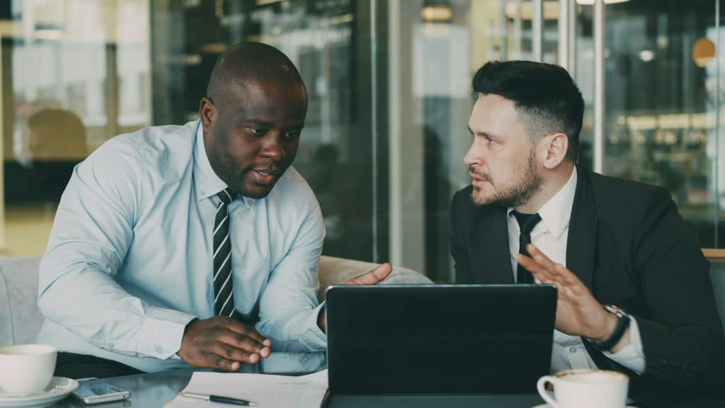 Two businessmen talking