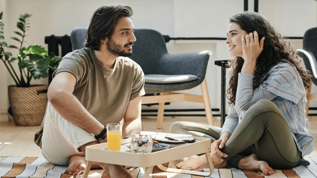 A couple talking during breakfast