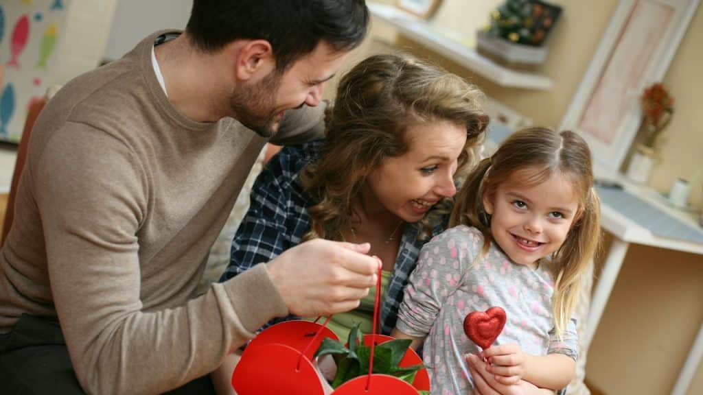 A smiling family celebrating Mother's Day.