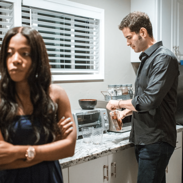 Couple Cooking in a Kitchen