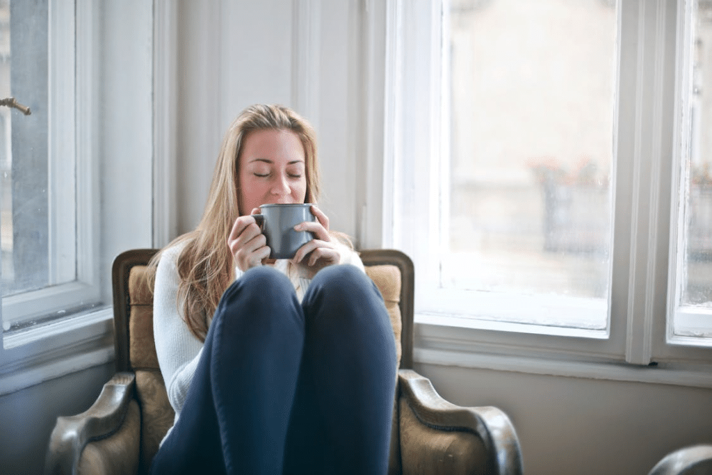 A woman holding a mug