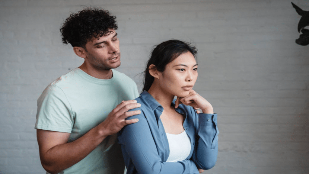 A man trying to apologize to his girlfriend