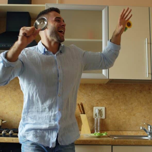 A man looking happy at home