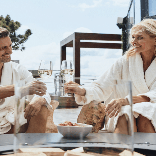 A mature couple having wine