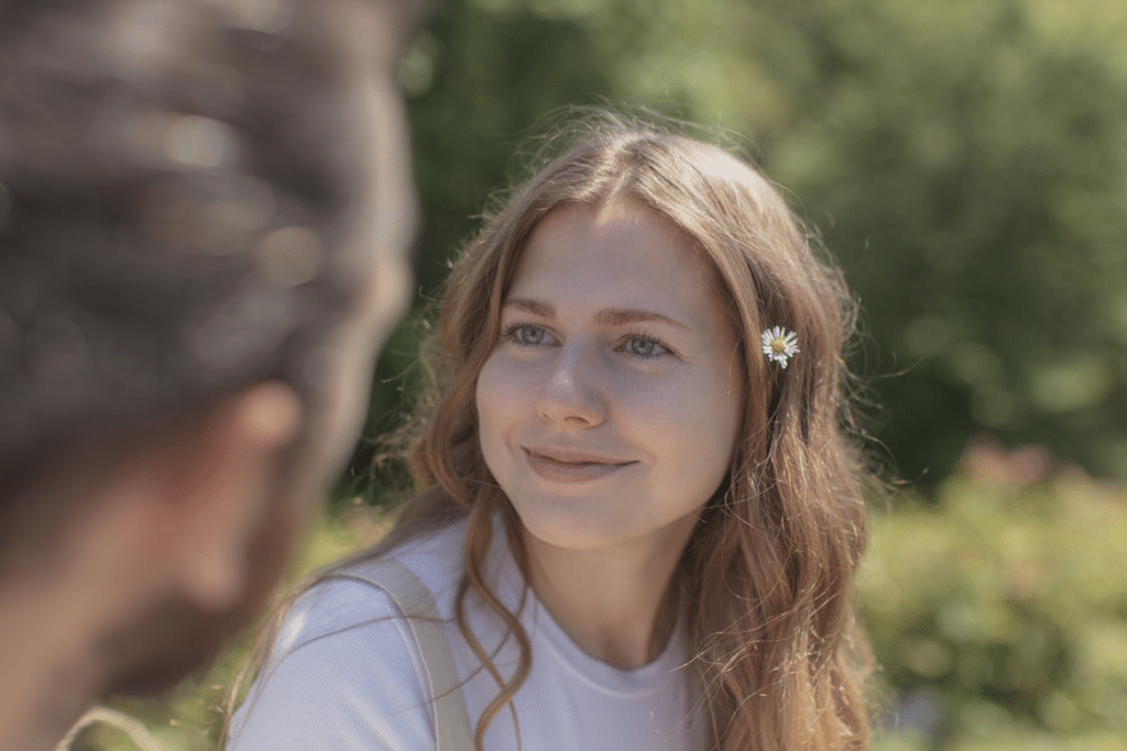 Smiling Woman in White Crew Neck Shirt