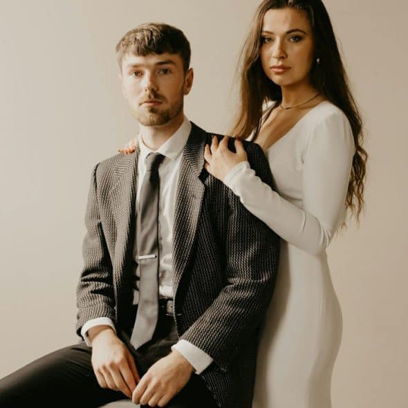 A man and a woman posing for a picture.