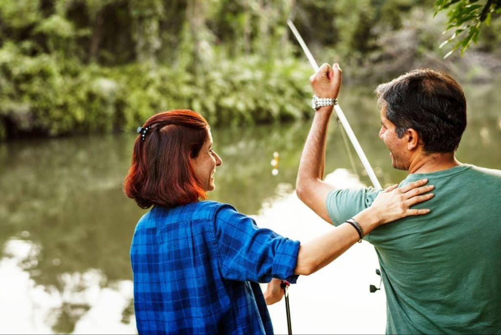 A man and woman fishing