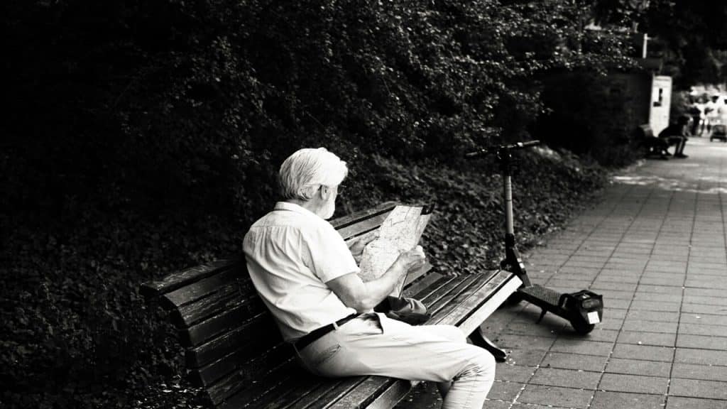 A man looking at a map outdoors