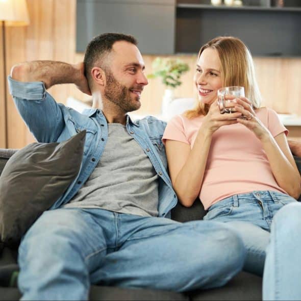 A man listening to a woman