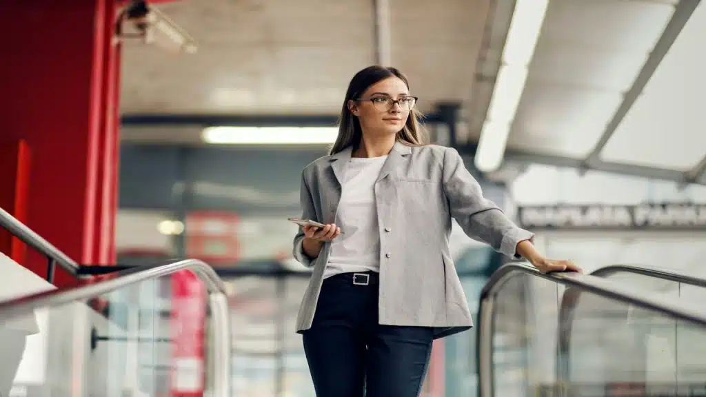 A woman on an escalator