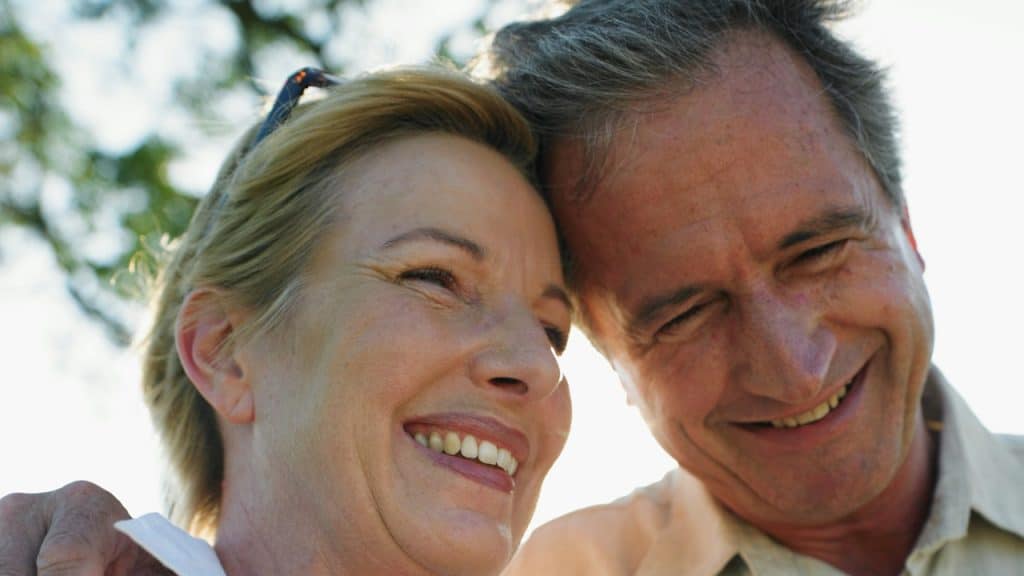 A couple smiling together.