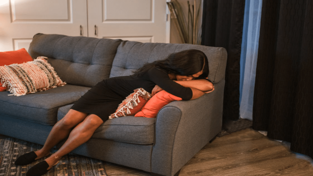 A woman crying in the living room