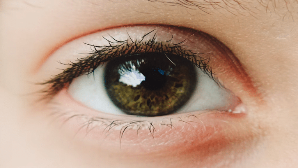 A close up photo of a dilated pupil