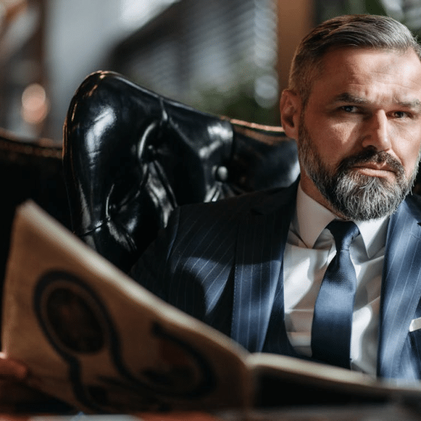A man holding a newspaper