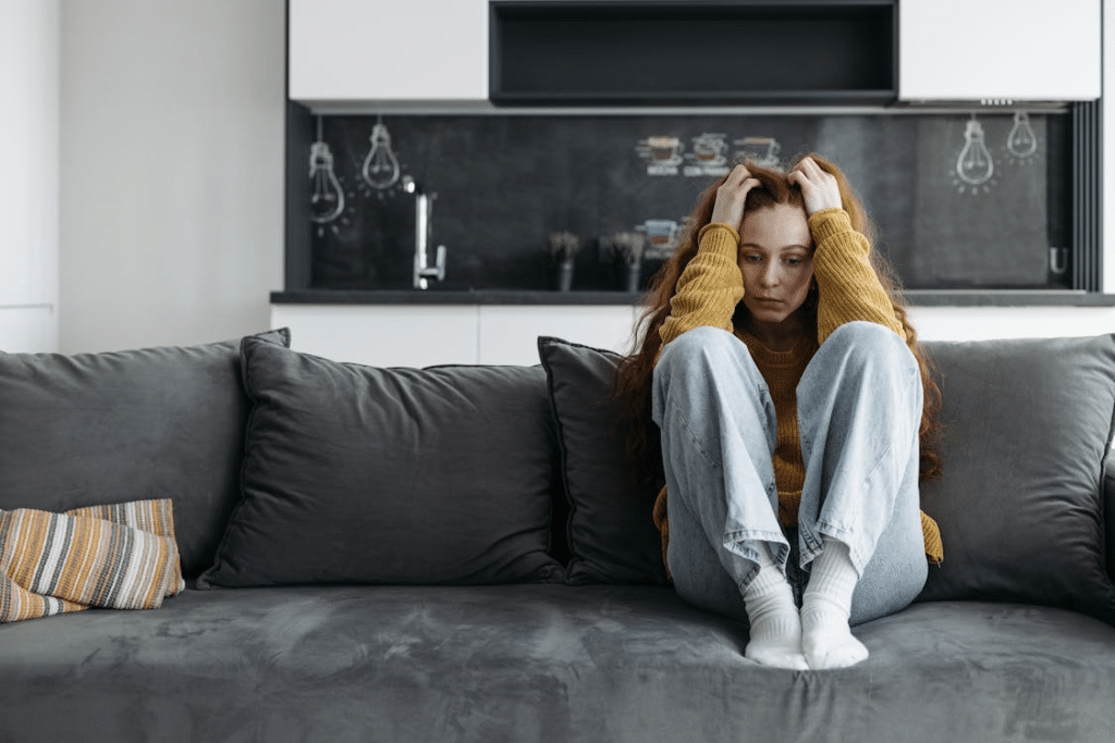 A woman sitting on a couch
