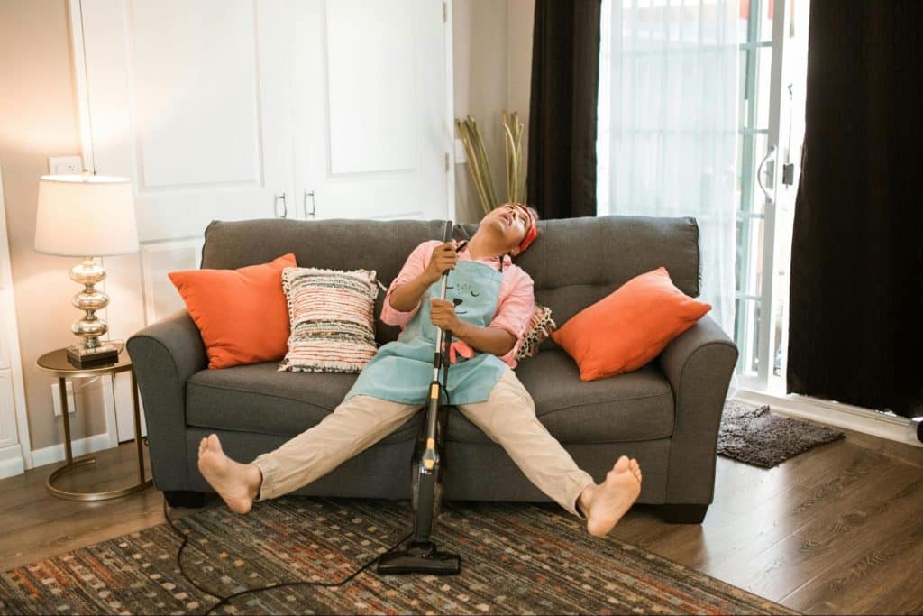 A man resting at the couch