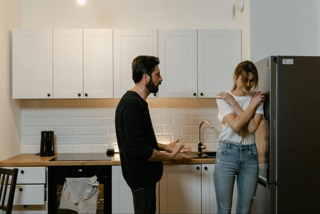 A man talking to woman