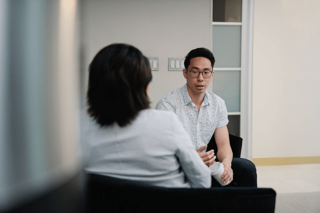 Woman and Man Talking During a Coffee Break